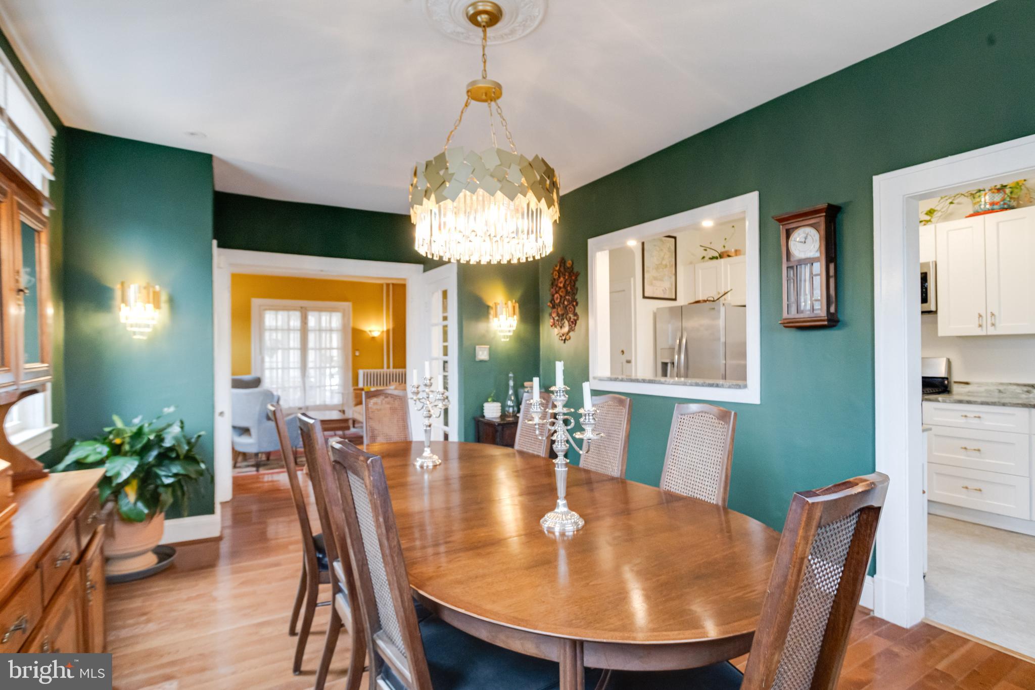 3901 Keswick Road Baltimore, MD 21211 - Photo 23 of 87 a view of a dining room with furniture window and wooden floor