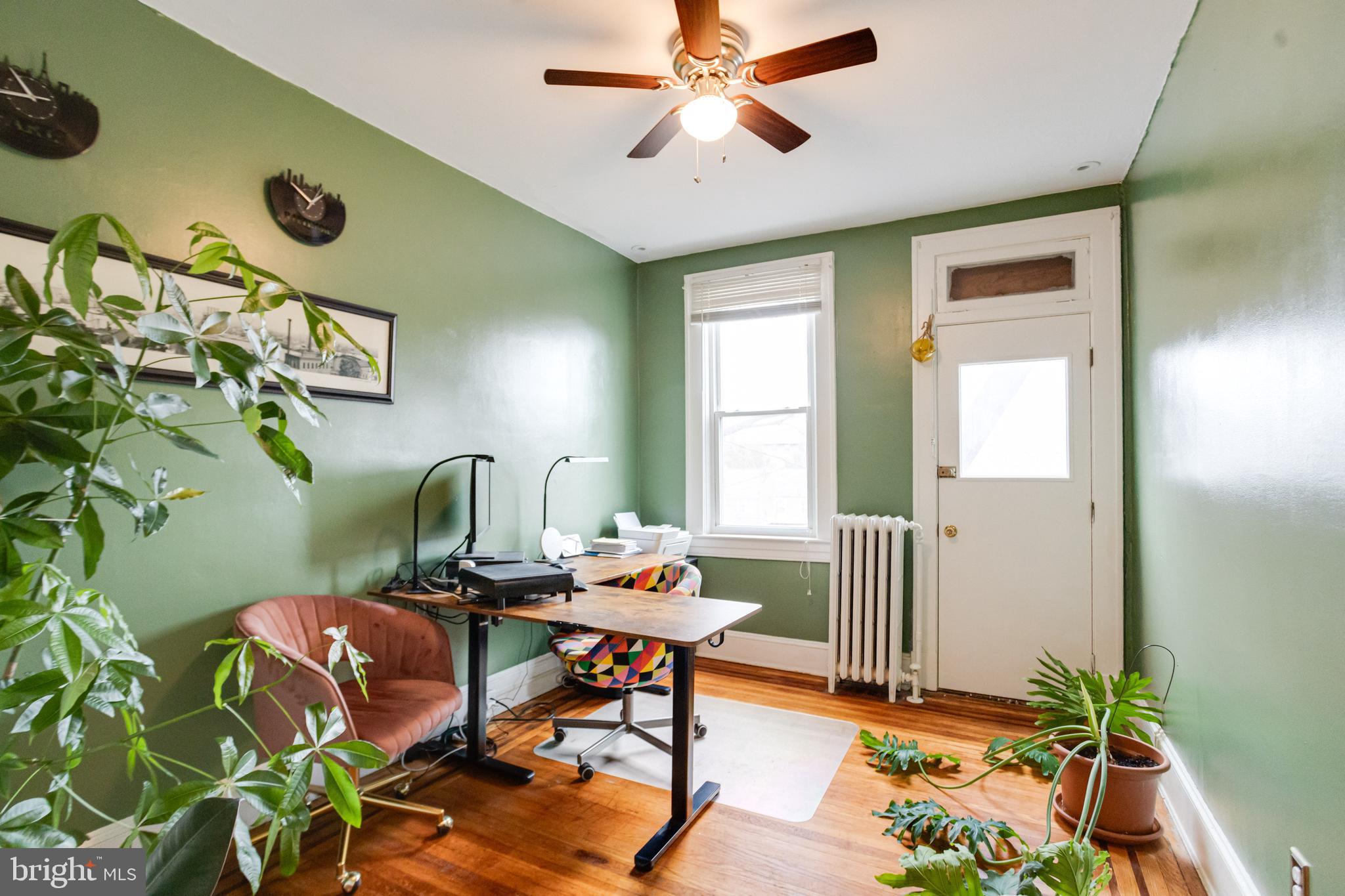 3901 Keswick Road Baltimore, MD 21211 - Photo 55 of 87 a living room with furniture and a window