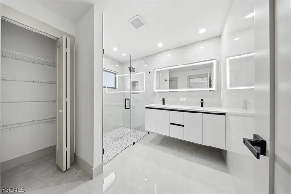 a bathroom with a shower and toilet