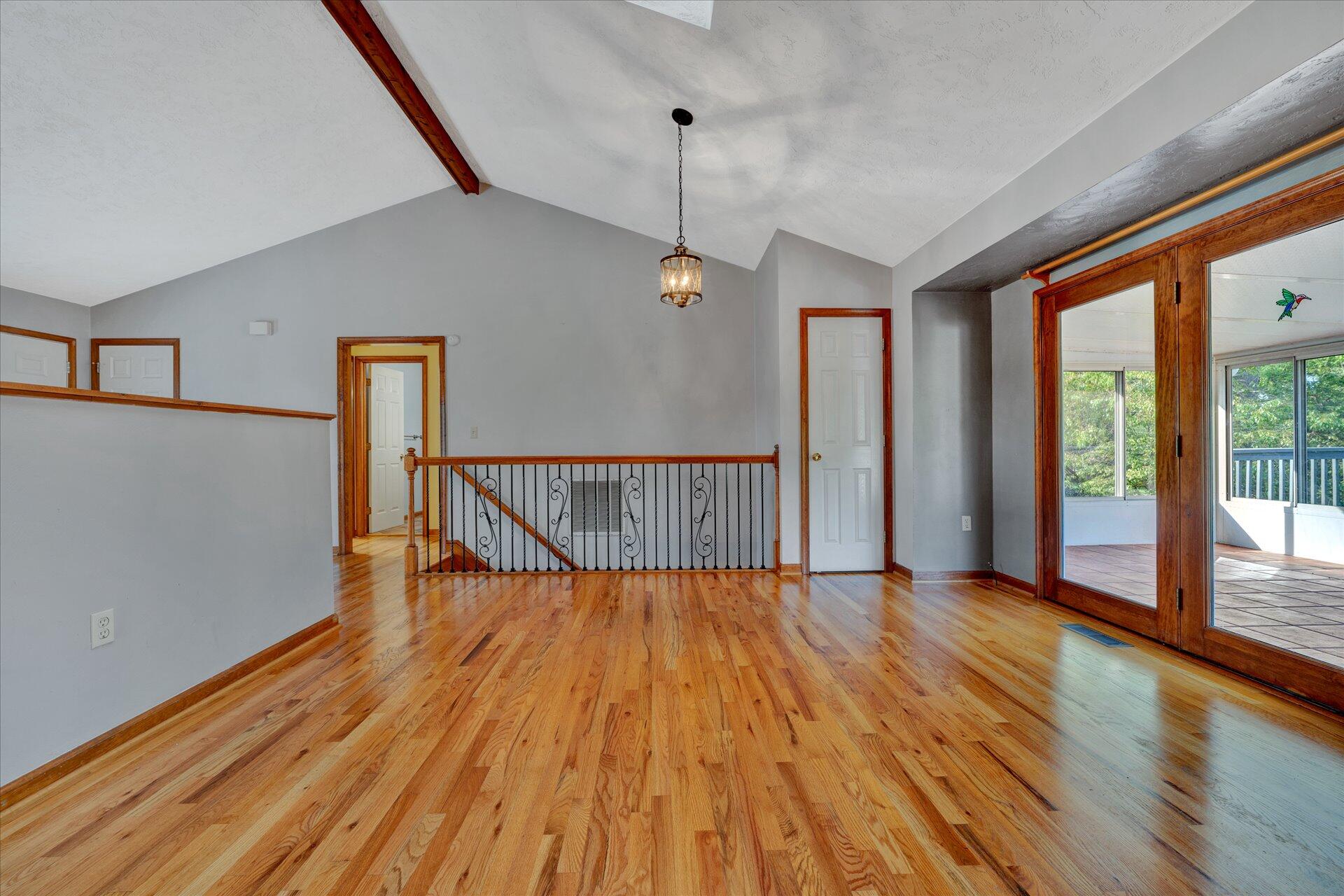 3700 Rte 3004 Roanoke, VA 24012 - Photo 12 of 40 a view of empty room with wooden floor and fan