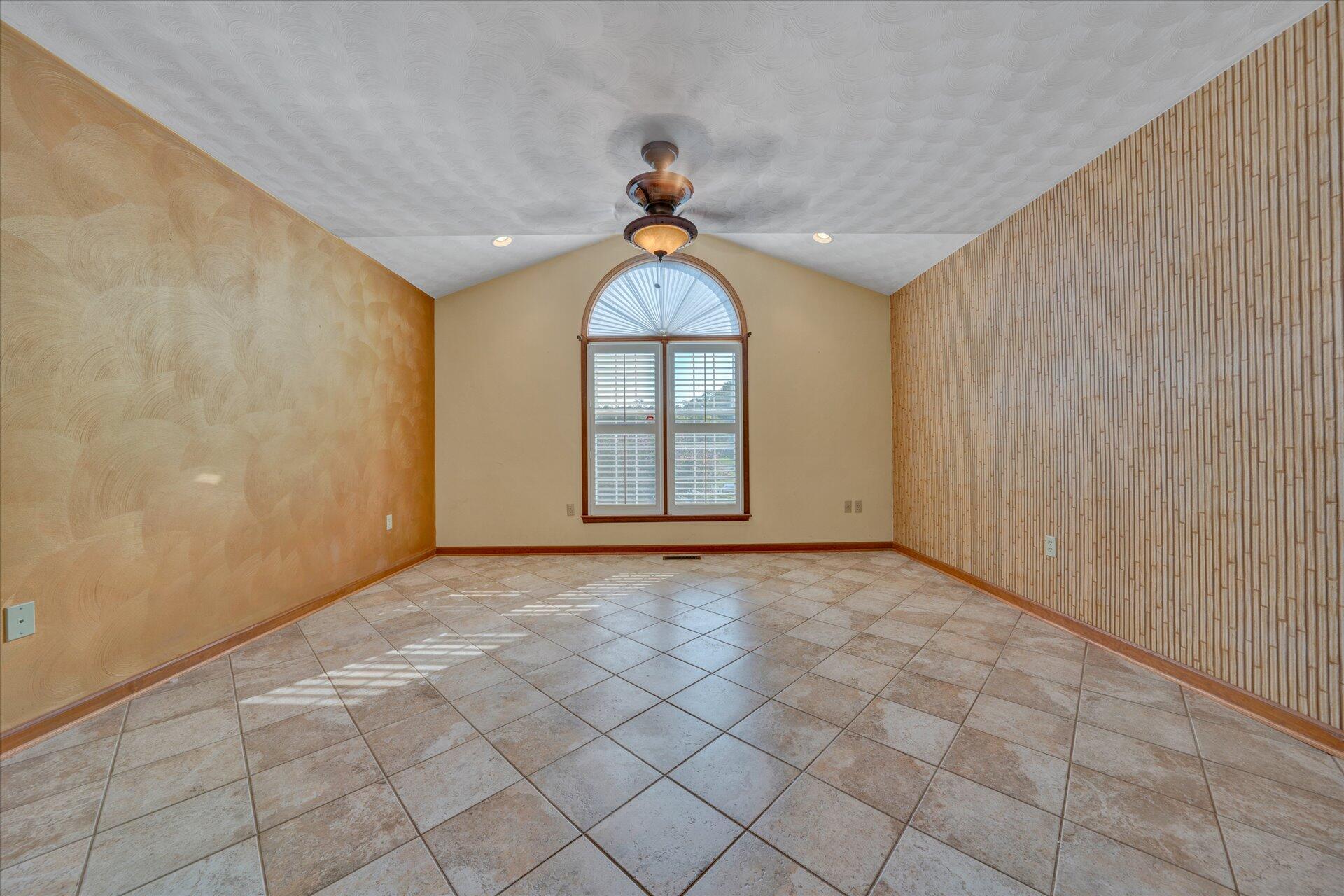 3700 Rte 3004 Roanoke, VA 24012 - Photo 19 of 40 en empty room with windows and chandelier