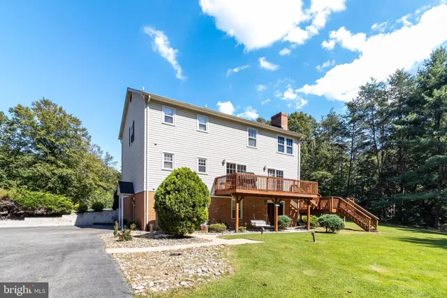 a front view of a house with swimming pool