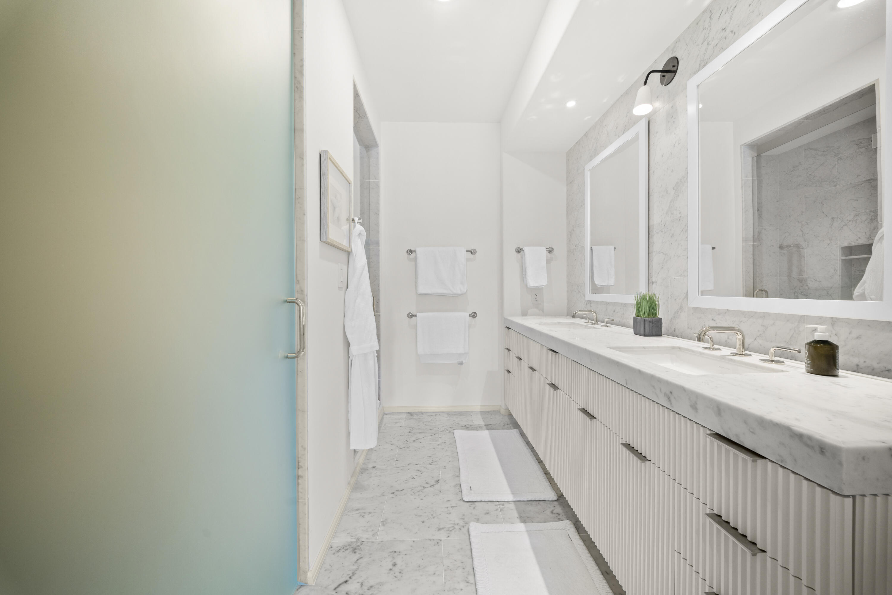 45 West Solaire Way Inlet Beach, Unit 107 Inlet Beach, FL 32461 - Photo 10 of 43 a spacious bathroom with a double vanity sink and a mirror