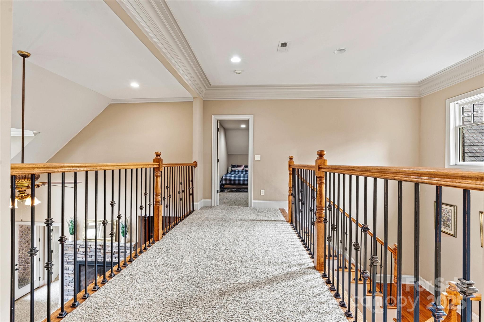 336 Kenway Loop Mooresville, NC 28117 - Photo 29 of 45 a view of a hallway with wooden floor