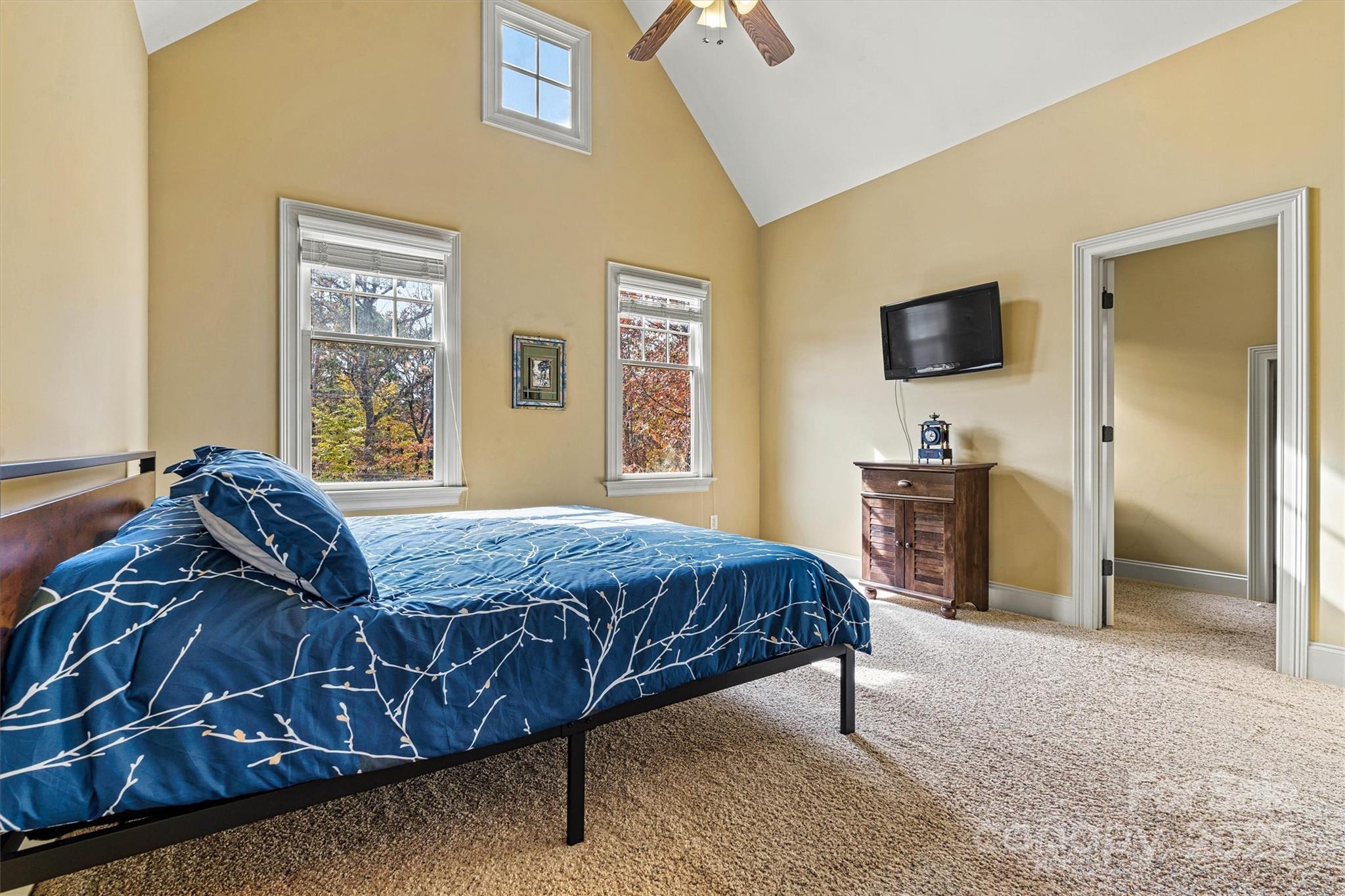 336 Kenway Loop Mooresville, NC 28117 - Photo 31 of 45 a bedroom with a bed and a television