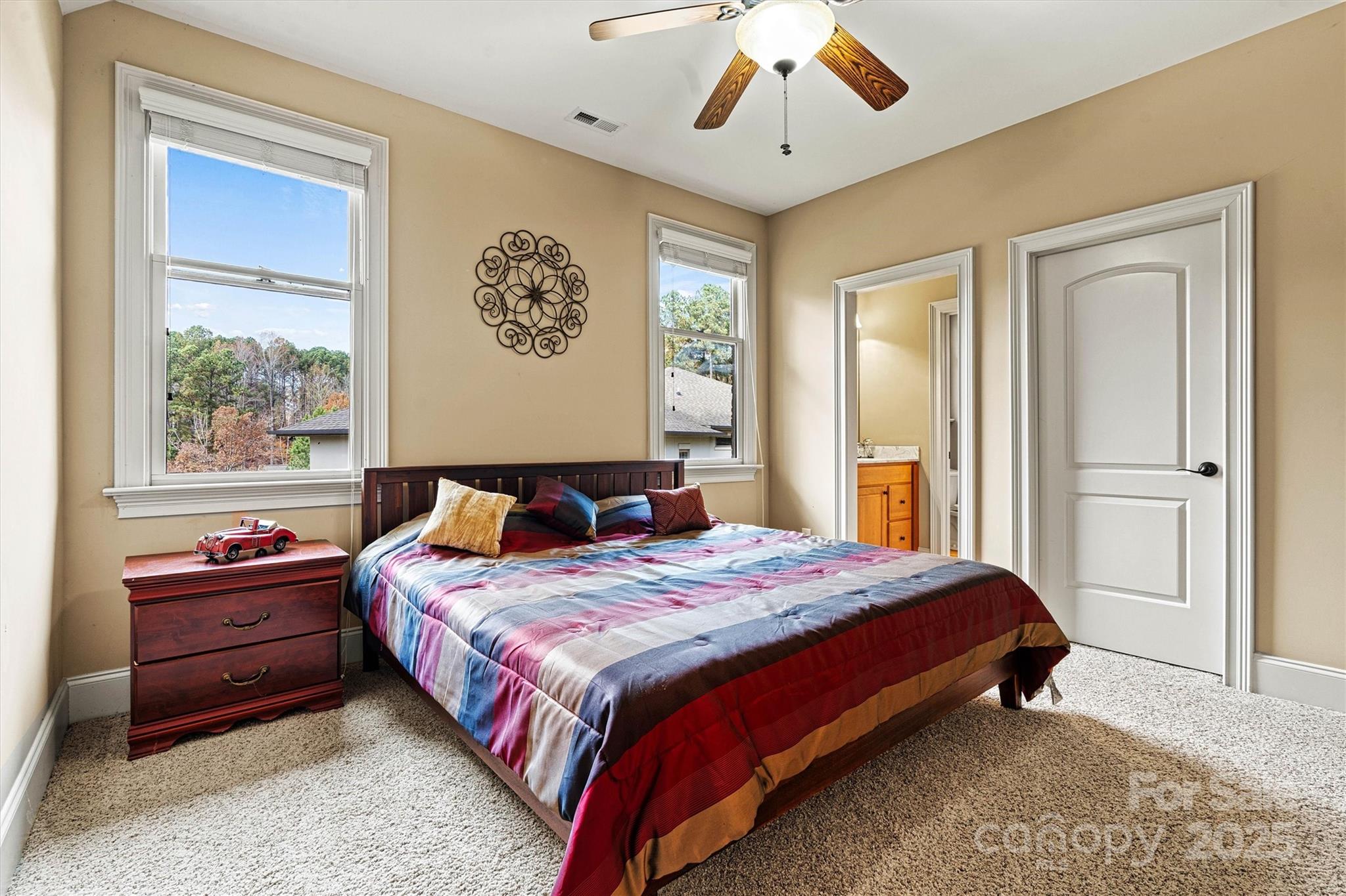 336 Kenway Loop Mooresville, NC 28117 - Photo 33 of 45 a bedroom with a large bed and a window