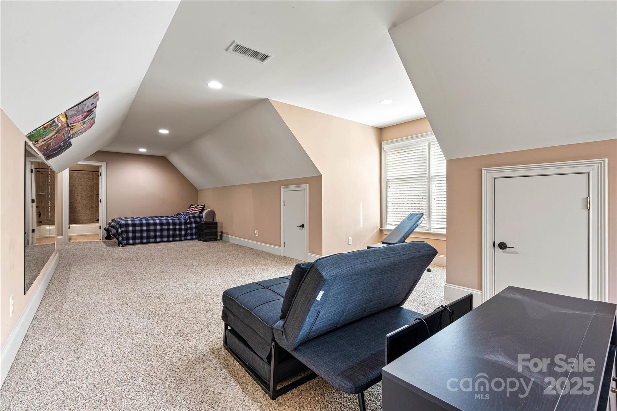 336 Kenway Loop Mooresville, NC 28117 - Photo 40 of 45 a living room with a couch and a coffee table