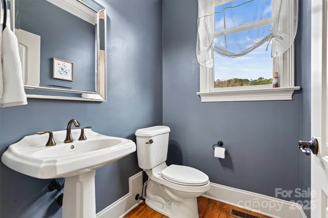 a bathroom with a sink and a toilet