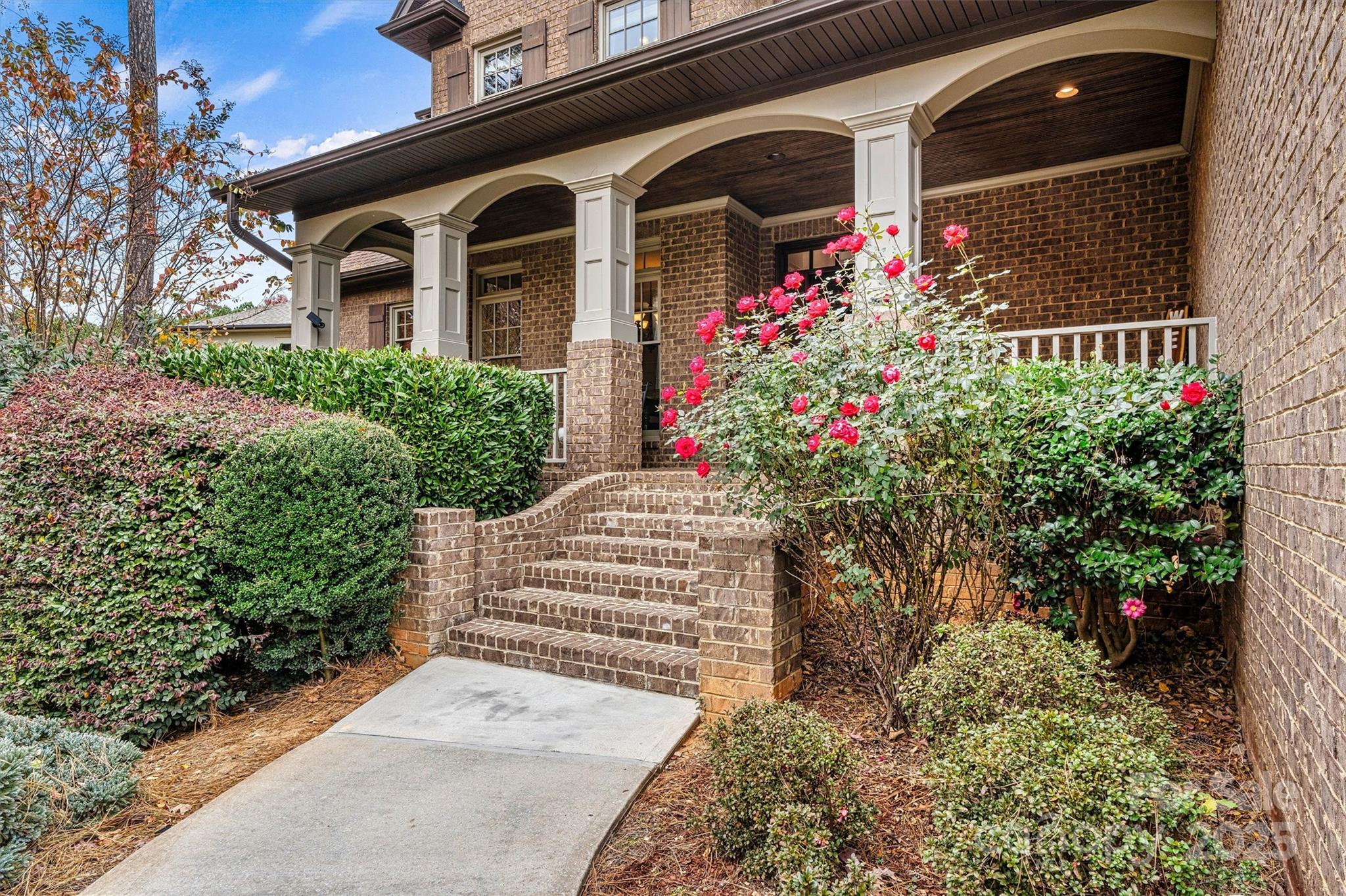 336 Kenway Loop Mooresville, NC 28117 - Photo 5 of 45 a front view of a house with a yard and fountain