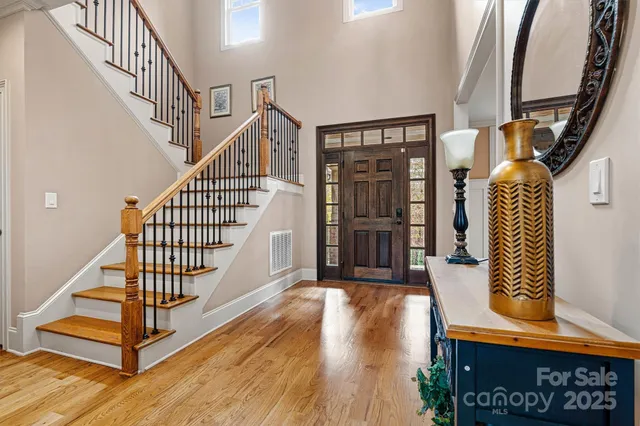 a view of entryway with wooden floor
