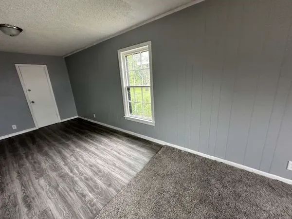 an empty room with windows