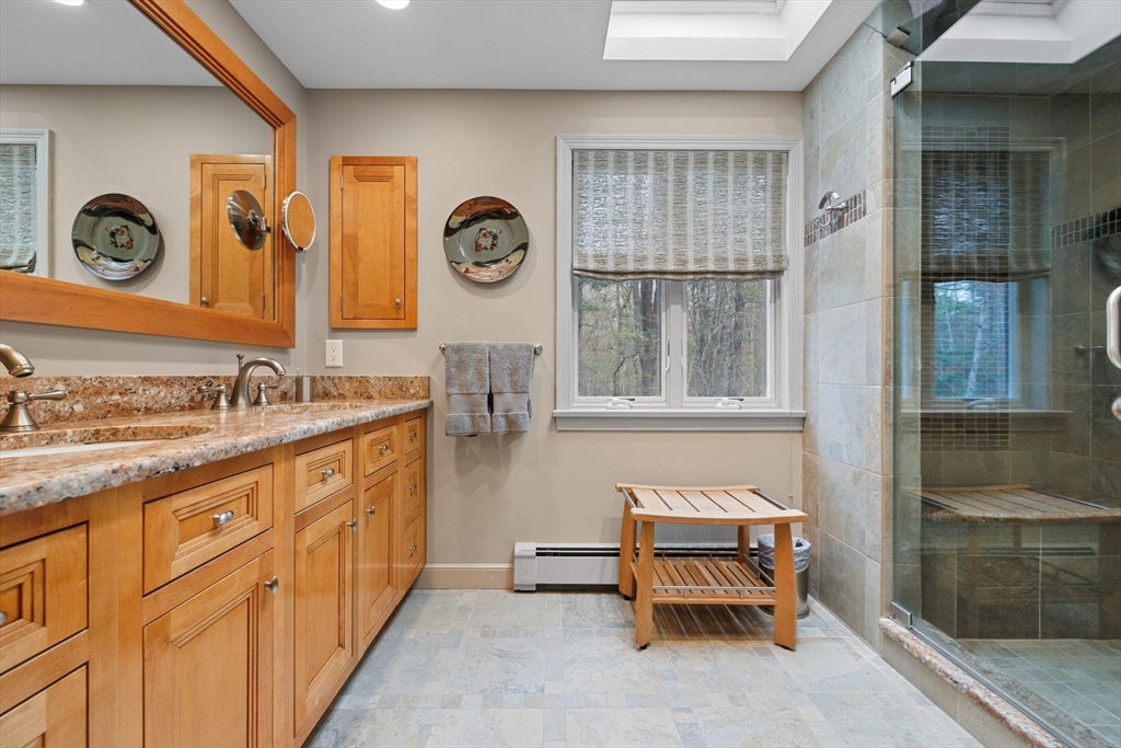 13 Townsend Road Lynnfield, MA 01940 - Photo 19 of 37 a spacious bathroom with a sink and a mirror