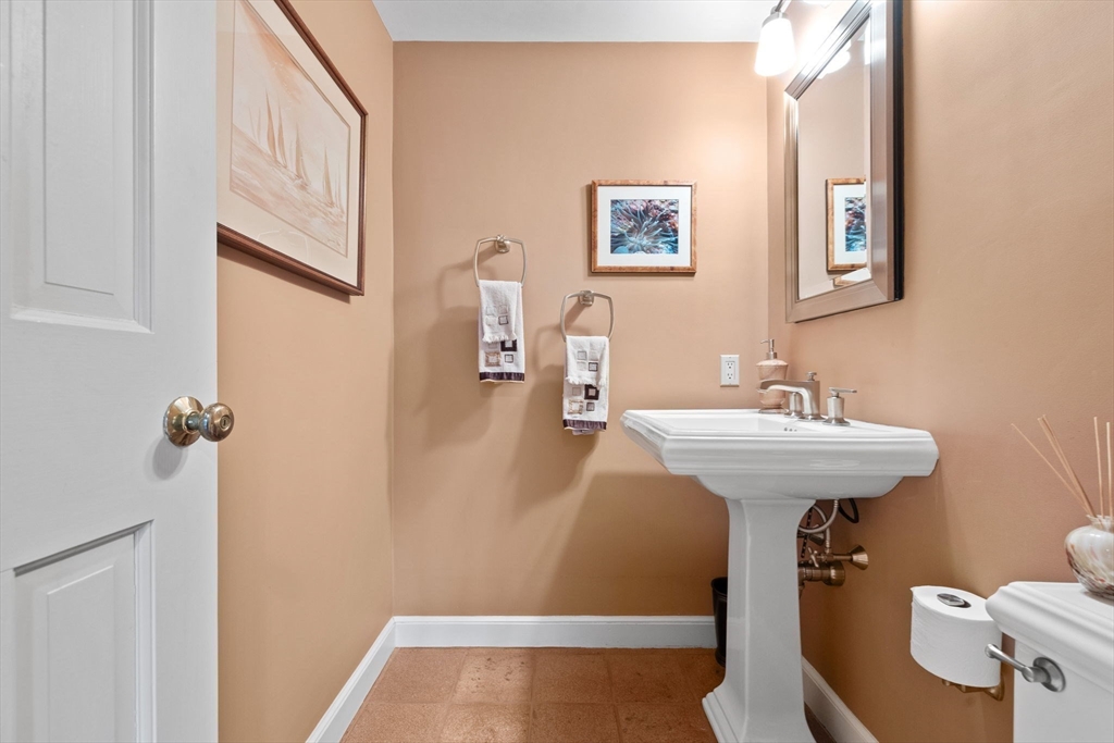 13 Townsend Road Lynnfield, MA 01940 - Photo 6 of 37 a bathroom with a sink and mirror