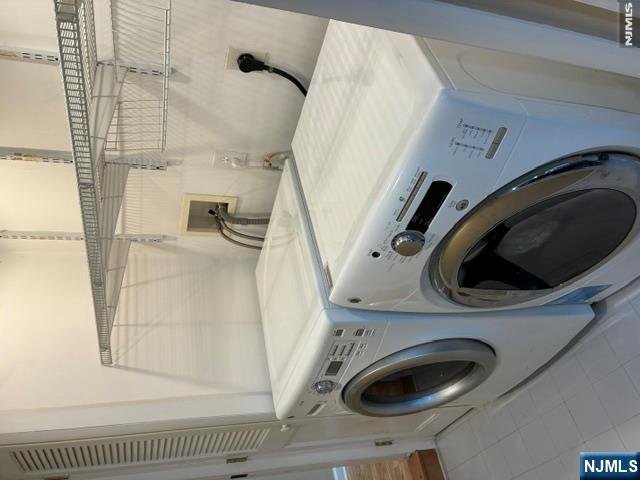 19 Crescent Road Wayne, NJ 07470 - Photo 18 of 26 a utility room with dryer and washer