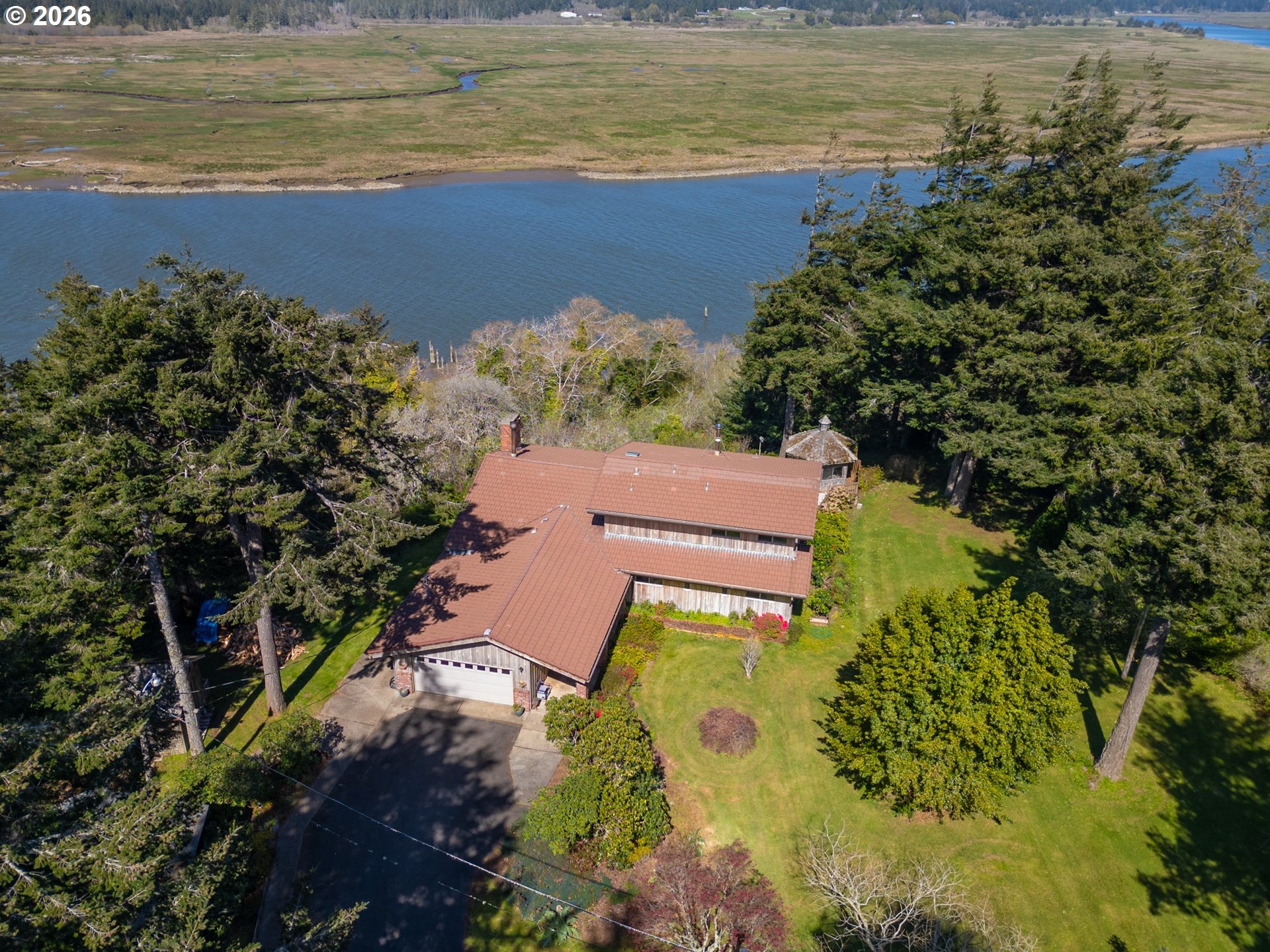 56358 Rusty Road Bandon, OR 97411 - Photo 2 of 41 a view of an ocean and beach