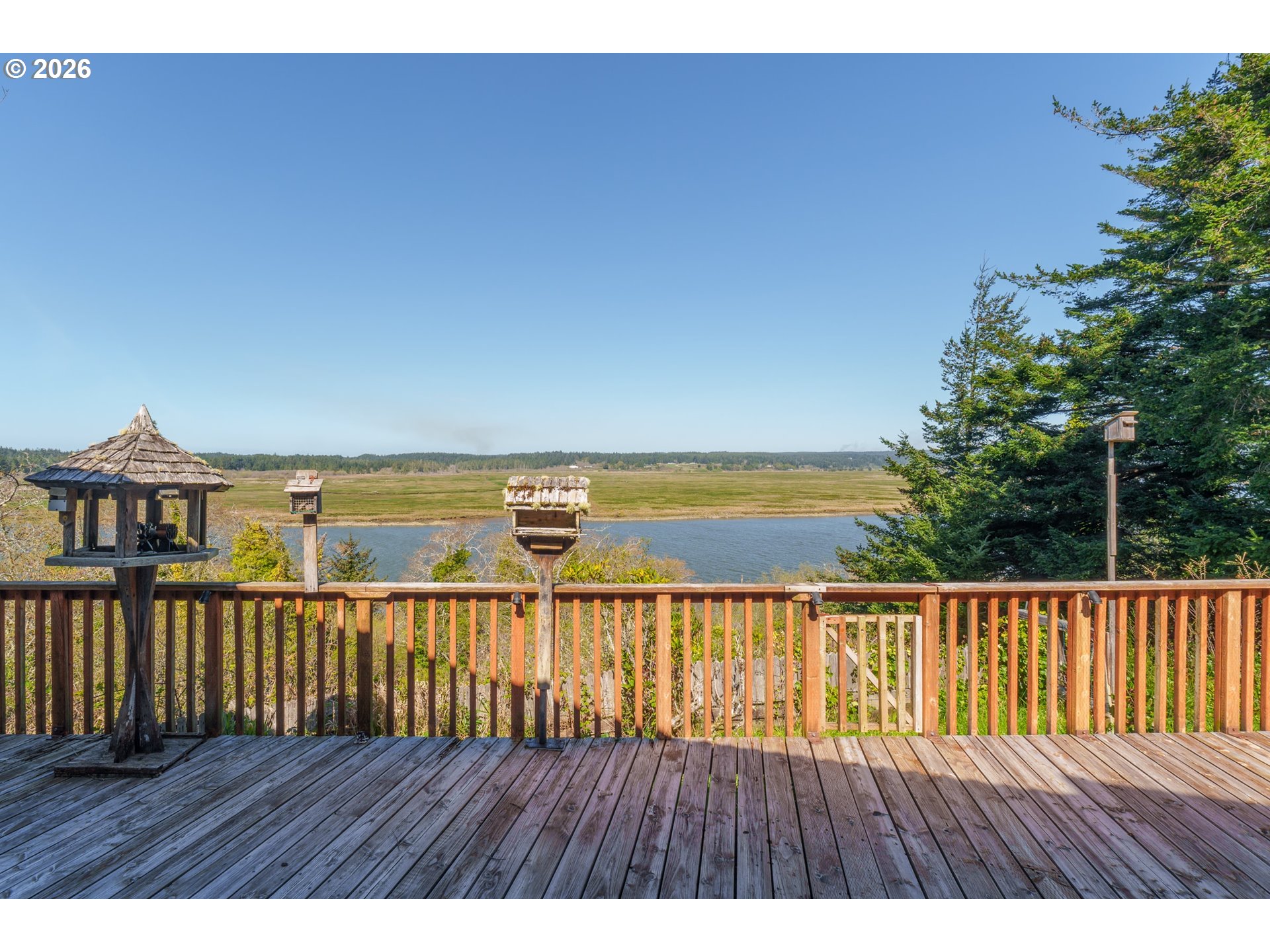 56358 Rusty Road Bandon, OR 97411 - Photo 8 of 41 a view of wooden floor with a roof deck