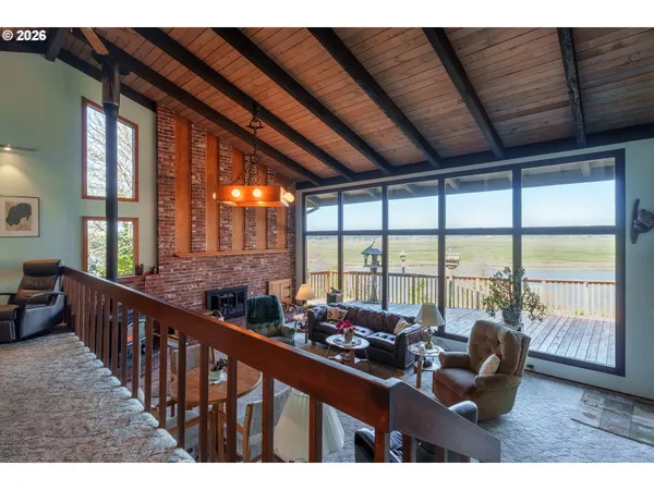 a living room with large windows