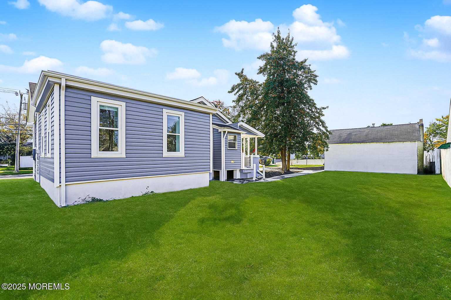 503 Ridge Avenue Neptune Township, NJ 07753 - Photo 5 of 17 a view of a house with a backyard