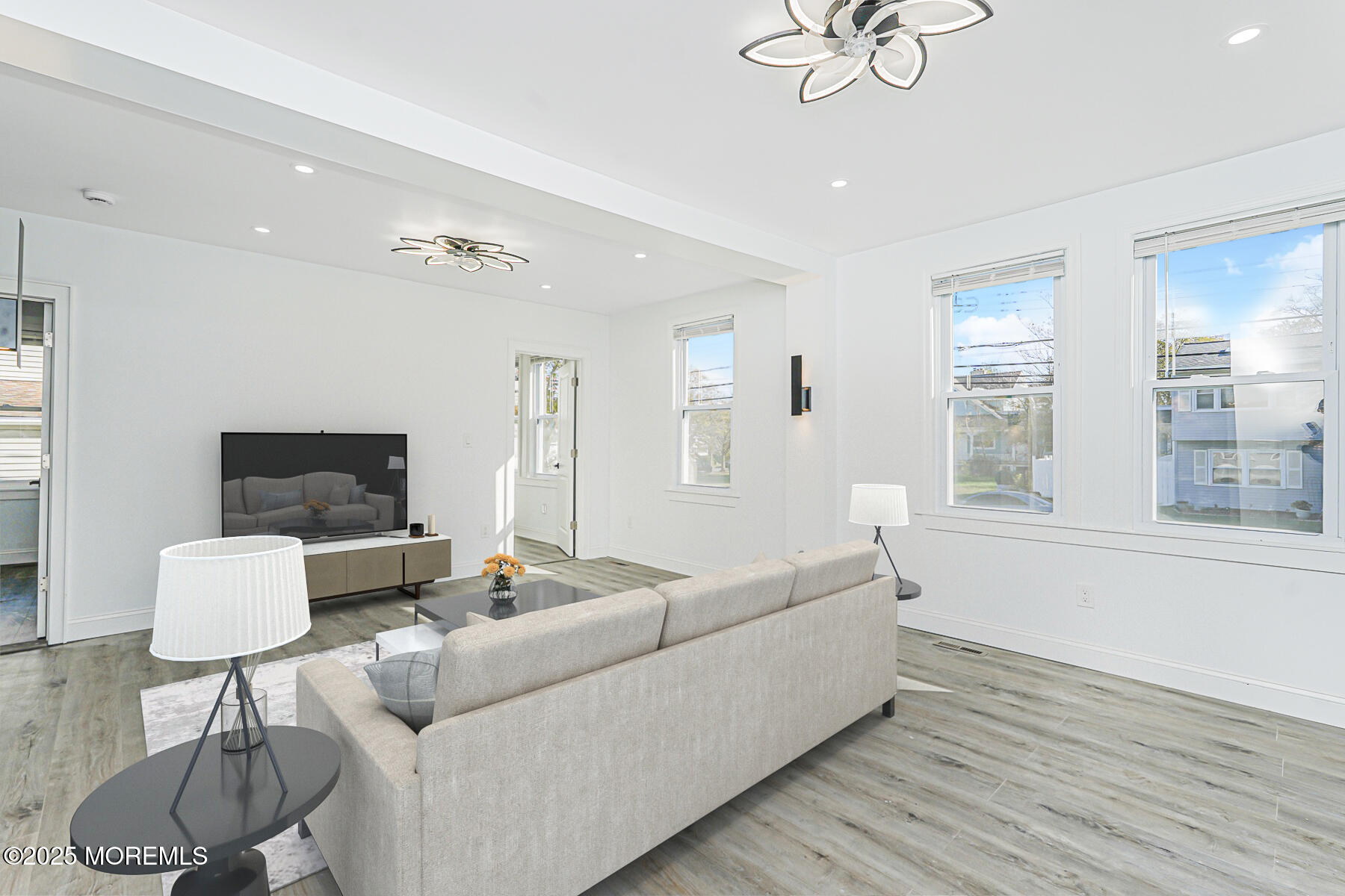 503 Ridge Avenue Neptune Township, NJ 07753 - Photo 8 of 17 a living room with furniture and a flat screen tv