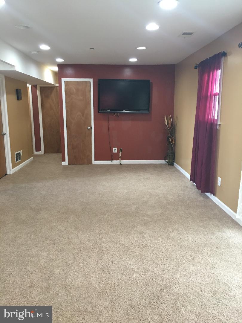 9817 Southall Road Randallstown, MD 21133 - Photo 28 of 32 Large basement for entertaining with Den/Office