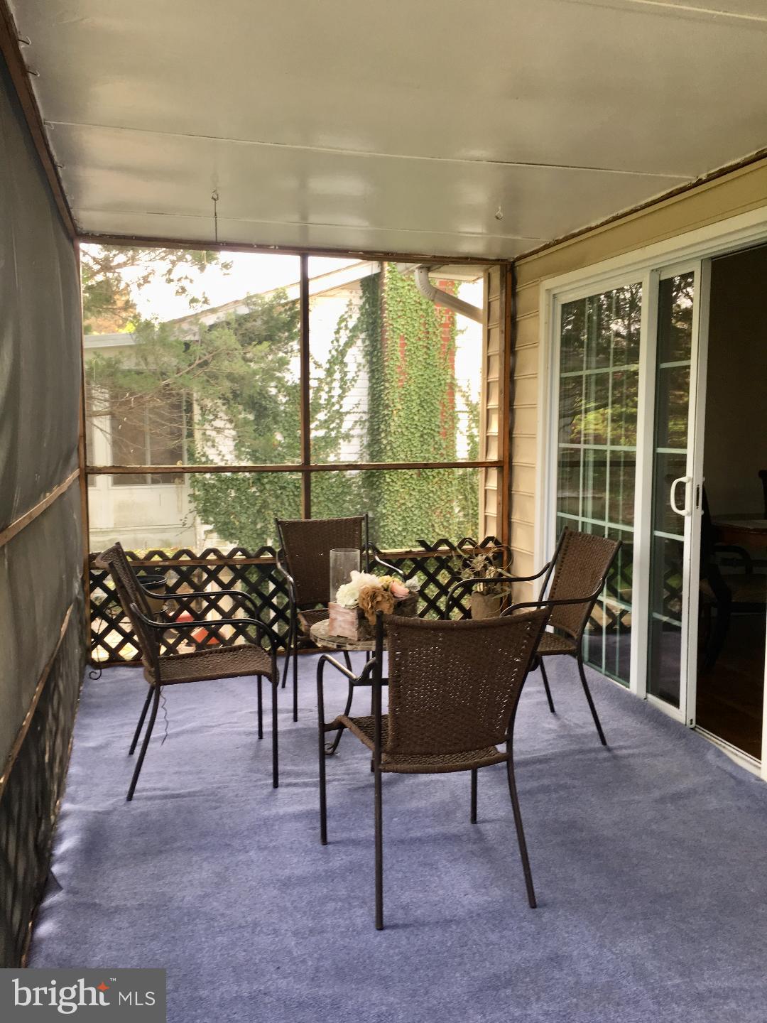 9817 Southall Road Randallstown, MD 21133 - Photo 32 of 32 screened in porch/deck for entertaining