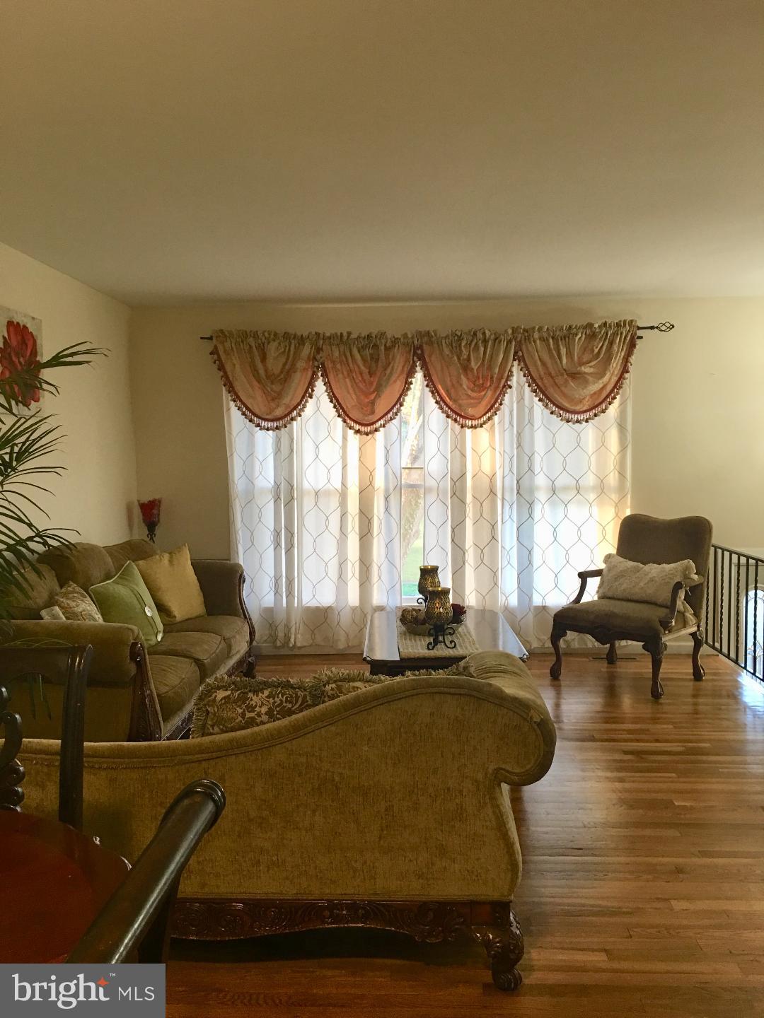 9817 Southall Road Randallstown, MD 21133 - Photo 8 of 32 Living Room with big front window