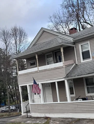 a view of a house with a roof deck