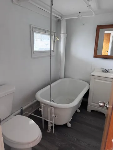 a bathroom with a sink and a toilet