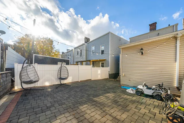 a view of a back yard of the house