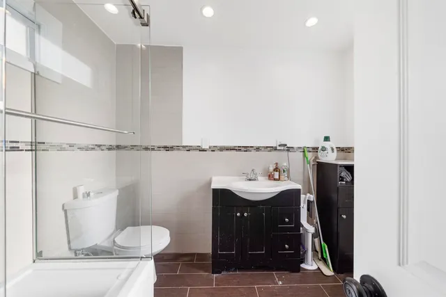 a bathroom with a sink and a toilet