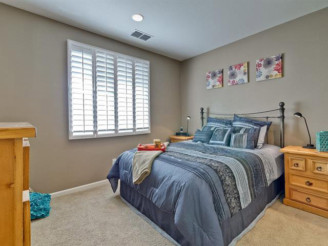 247 Peppermint Tree Terrace, Unit 3 Sunnyvale, CA 94086 - Photo 11 of 25 a bedroom with a bed and a window