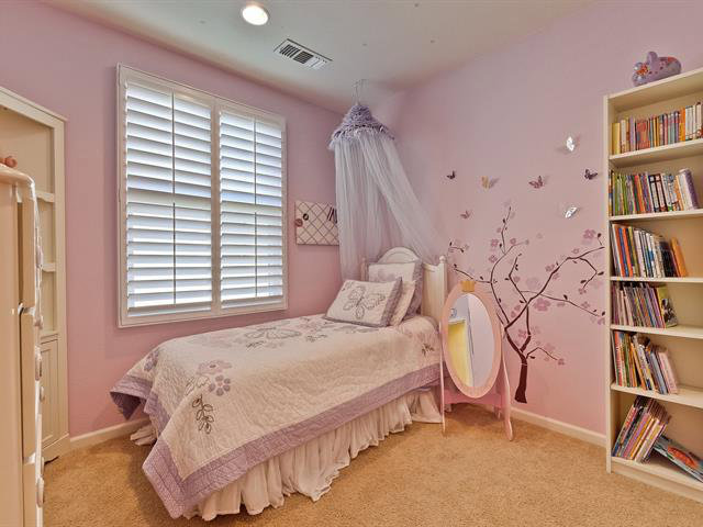 247 Peppermint Tree Terrace, Unit 3 Sunnyvale, CA 94086 - Photo 20 of 25 a bedroom with a bed furniture and a book shelf