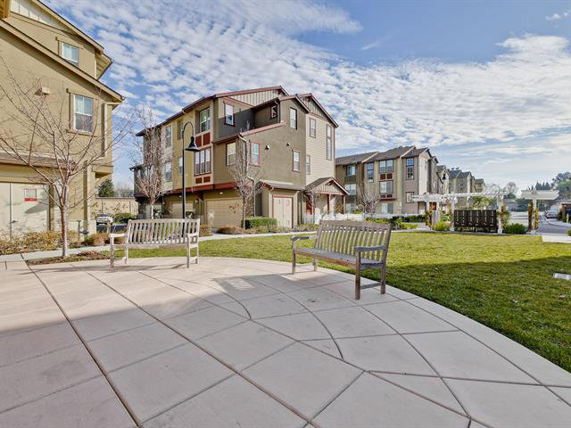 247 Peppermint Tree Terrace, Unit 3 Sunnyvale, CA 94086 - Photo 22 of 25 a view of a building with a swimming pool