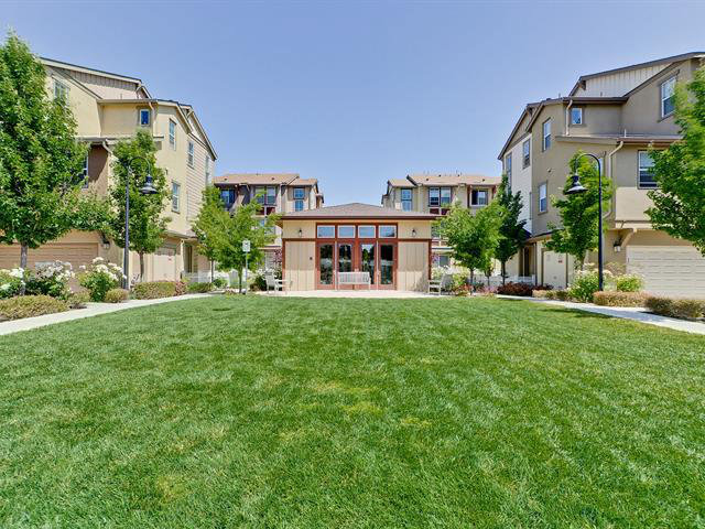 247 Peppermint Tree Terrace, Unit 3 Sunnyvale, CA 94086 - Photo 23 of 25 front view of a house with a yard