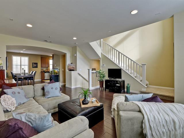 247 Peppermint Tree Terrace, Unit 3 Sunnyvale, CA 94086 - Photo 3 of 25 a living room with furniture and a fireplace