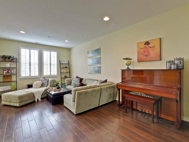 247 Peppermint Tree Terrace, Unit 3 Sunnyvale, CA 94086 - Photo 5 of 25 a living room with furniture and a wooden floor