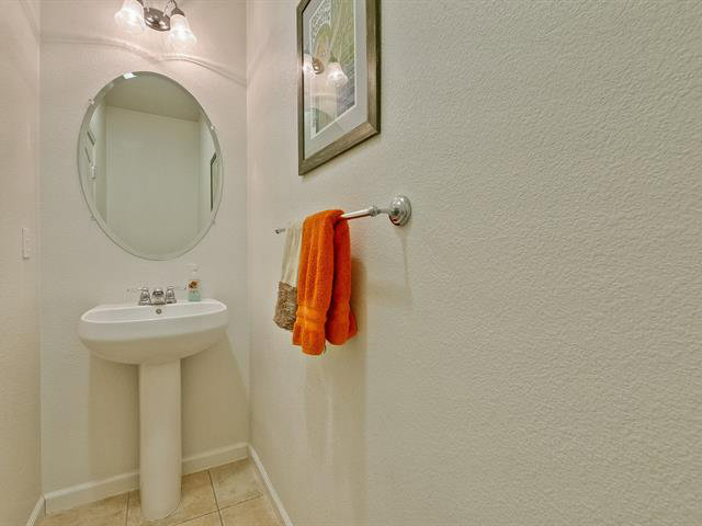 247 Peppermint Tree Terrace, Unit 3 Sunnyvale, CA 94086 - Photo 10 of 25 a bathroom with a sink and a mirror