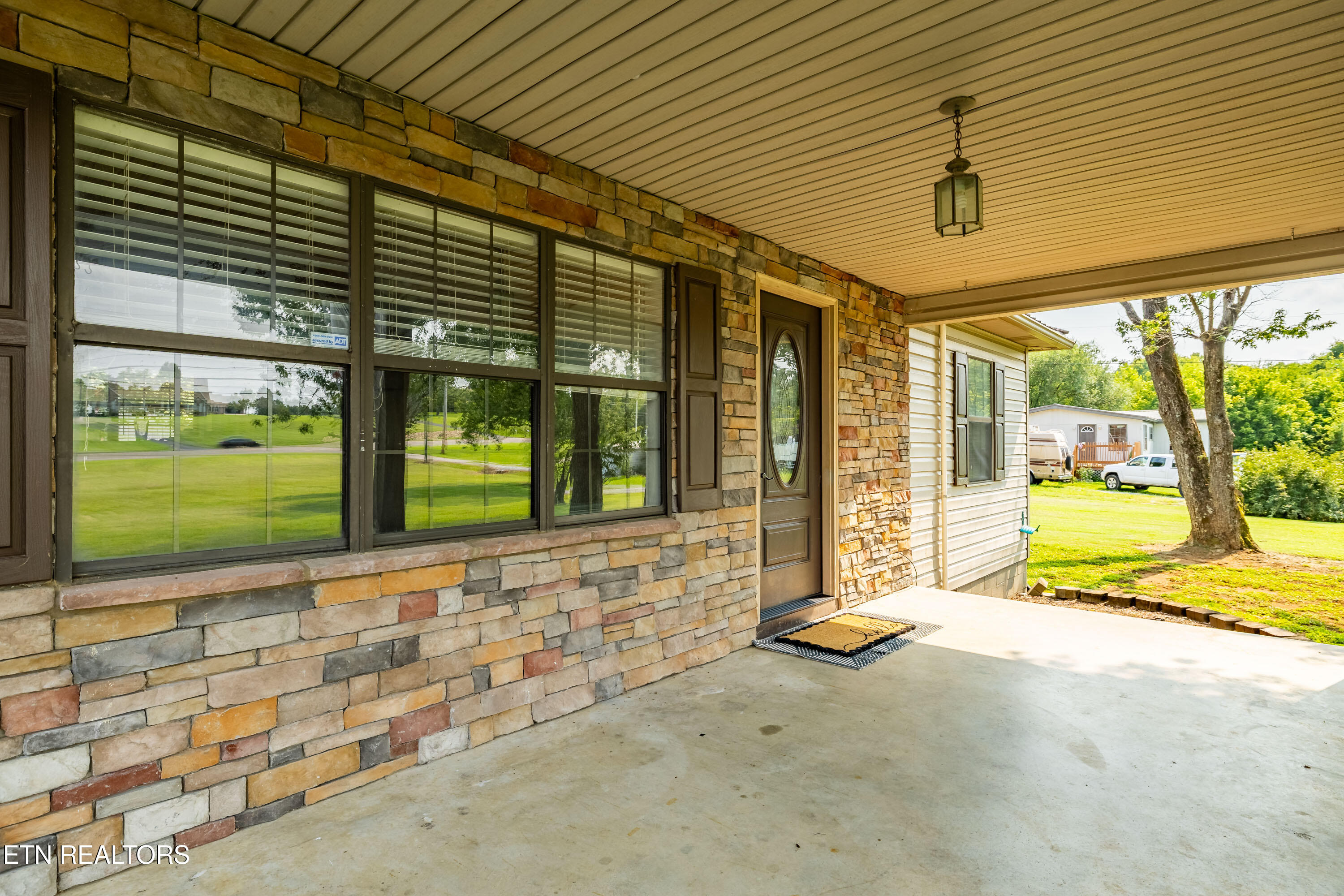 170 Dotson Road Greenback, TN 37742 - Photo 3 of 37 Deep Covered Front Porch