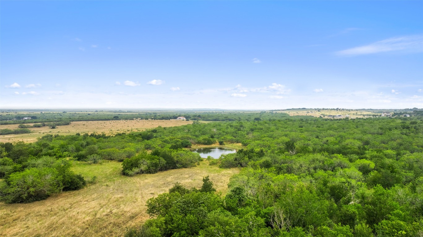 3575 Westwood Road Lockhart, TX 78644 - Photo 12 of 32 a view of a lake with a city