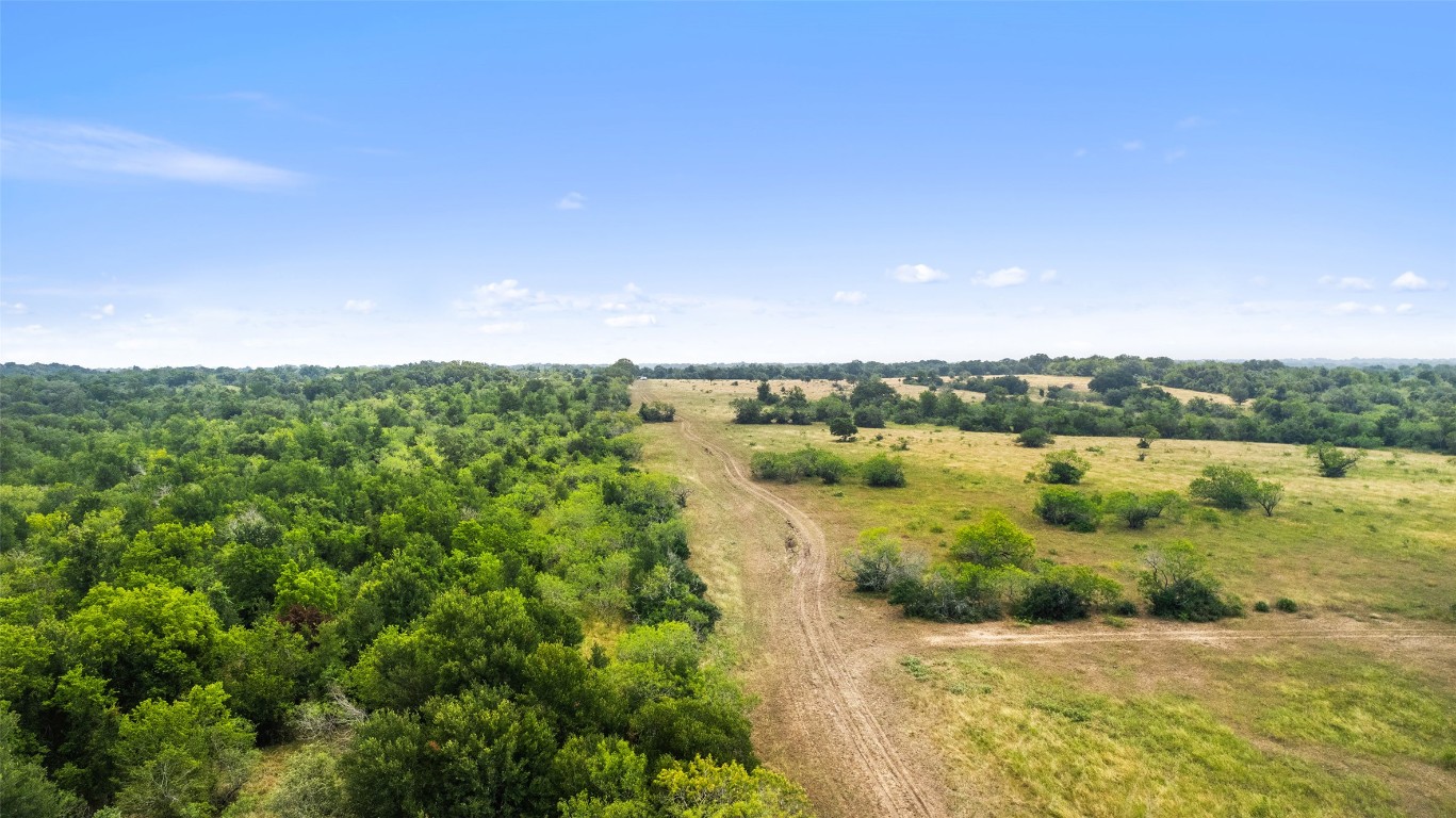 3575 Westwood Road Lockhart, TX 78644 - Photo 13 of 32 a view of a lake with houses in the back