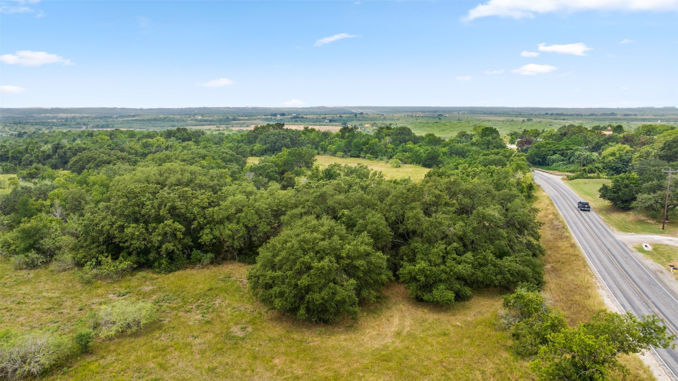 3575 Westwood Road Lockhart, TX 78644 - Photo 29 of 32 a view of a yard with an outdoor seating