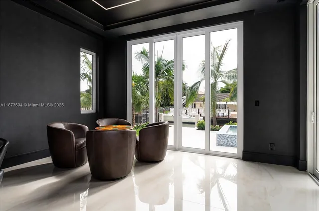 a bathroom with a granite countertop toilet sink and mirror
