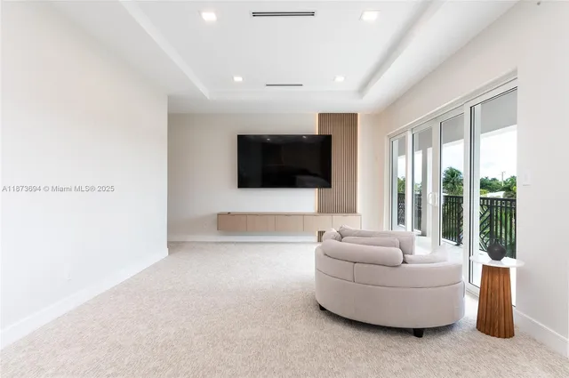 a utility room with sink dryer and washer