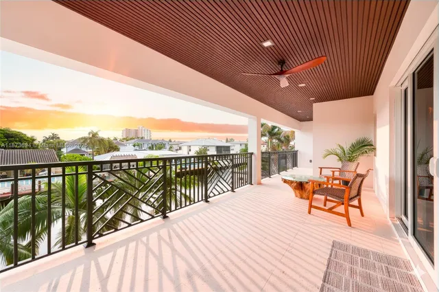 a patio with a table and chairs
