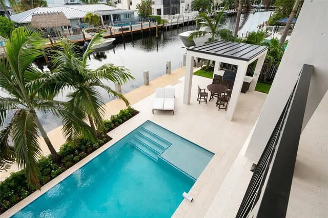 a view of a backyard of a house