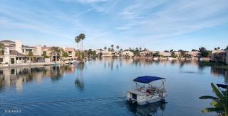 1450 West Key Largo Court Gilbert, AZ 85233 - Photo 5 of 5 a view of a lake with houses
