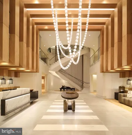 a bathroom with a sink a mirror and a shower