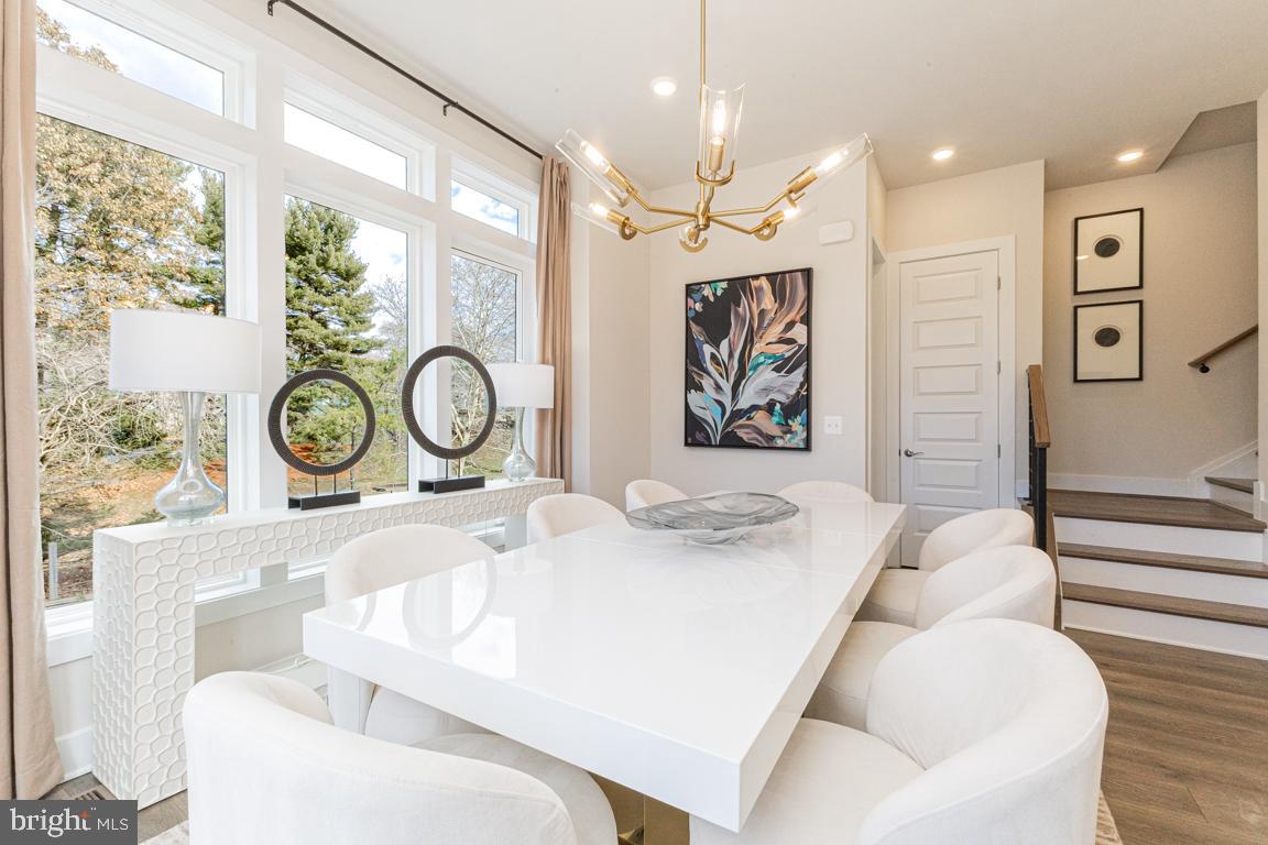 11652 American Dream Way Reston, VA 20190 - Photo 15 of 51 a view of a dining area with furniture window and wooden floor