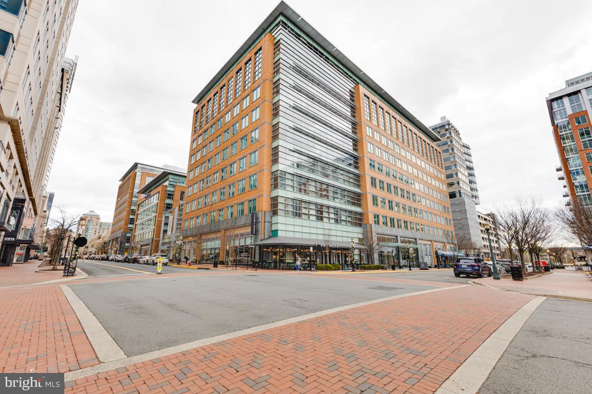 11652 American Dream Way Reston, VA 20190 - Photo 41 of 51 a city street lined with buildings and cars