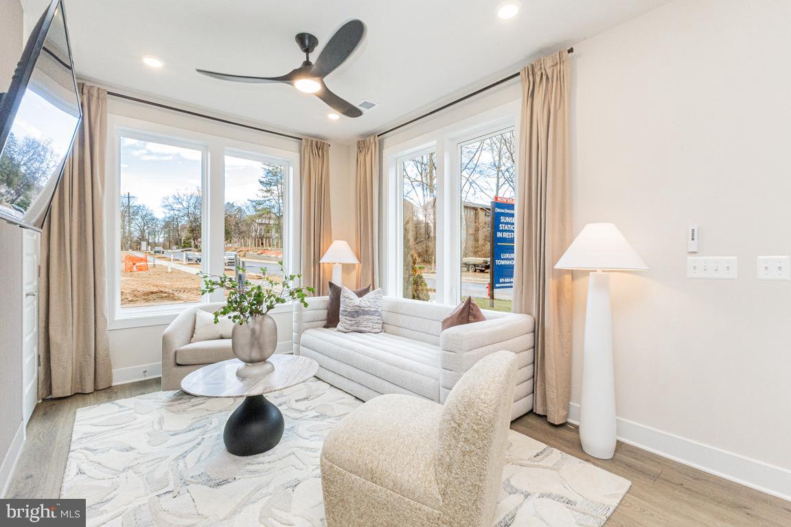 11652 American Dream Way Reston, VA 20190 - Photo 5 of 51 a living room with furniture and a large window